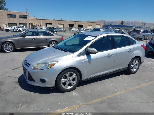2013 FORD FOCUS 1FADP3F2XDL308200 Photo 1