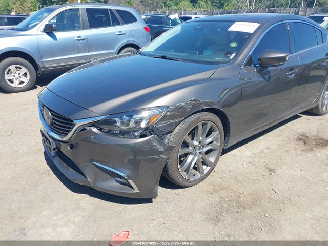 JM1GL1W54H1136359 Mazda py