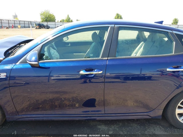 5XXGT4L34GG115499 KIA Optima Lx