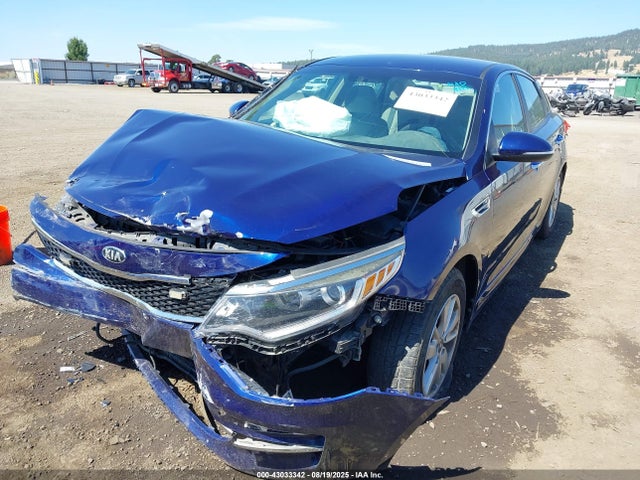 5XXGT4L34GG115499 KIA Optima Lx