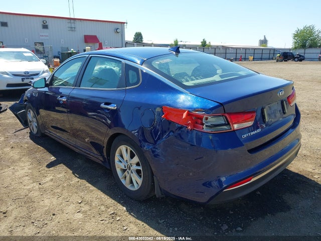 5XXGT4L34GG115499 KIA Optima Lx