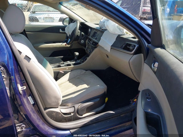 5XXGT4L34GG115499 KIA Optima Lx
