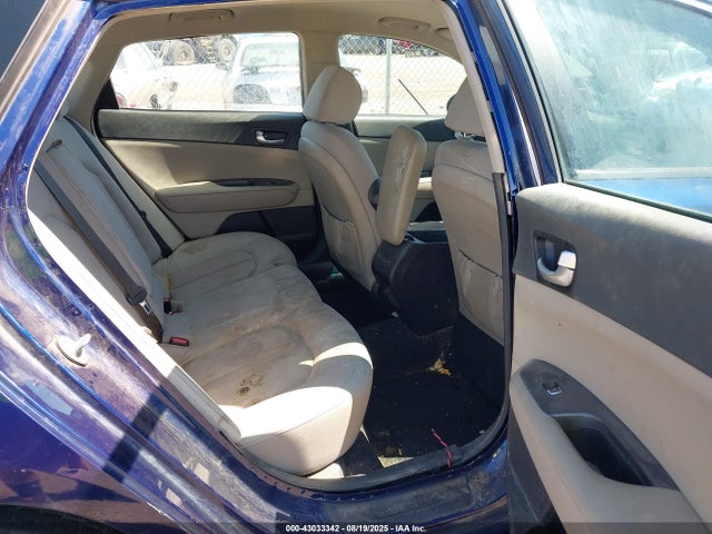 5XXGT4L34GG115499 KIA Optima Lx