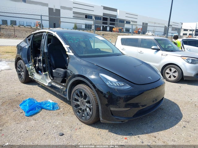 2023 TESLA MODEL Y 7SAYGDEE9PA030510 Photo 0