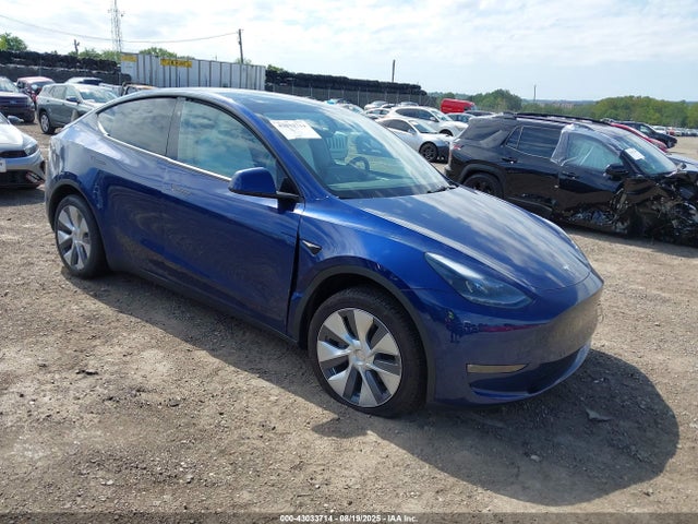 2024 TESLA MODEL Y 7SAYGDEE9RA251902 Photo 0