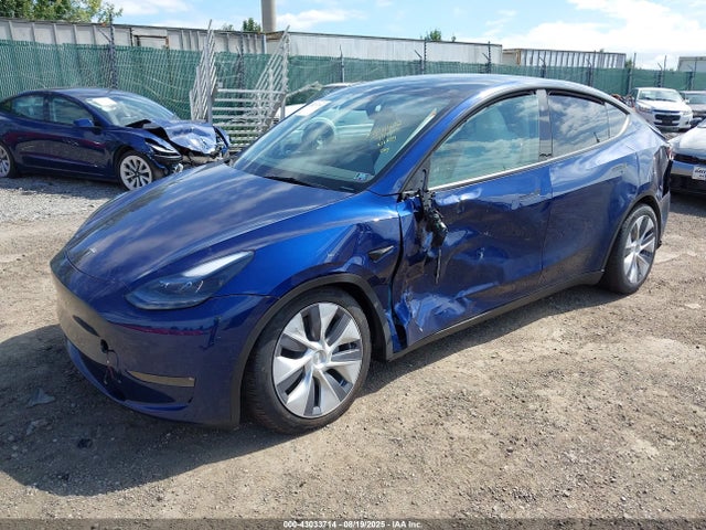 2024 TESLA MODEL Y 7SAYGDEE9RA251902 Photo 1