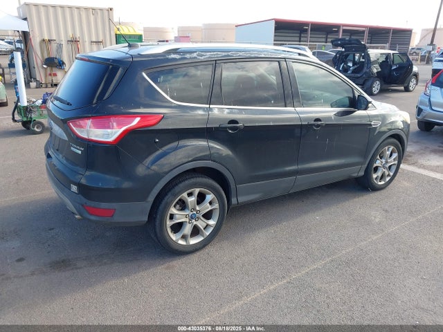 1FMCU0J94EUB72896 Ford 2014