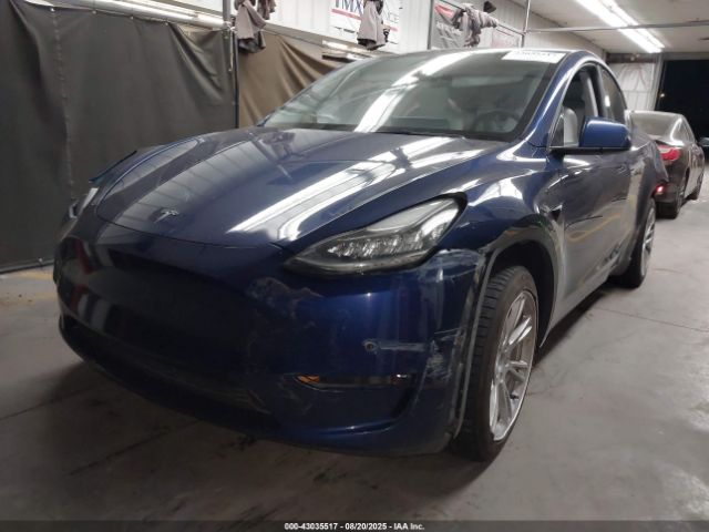 2023 TESLA MODEL Y 7SAYGDEE1PF592002 Photo 1