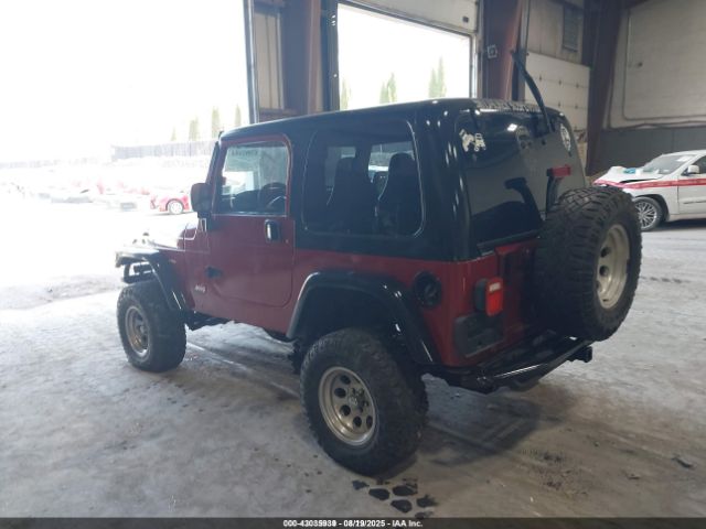 2000 JEEP WRANGLER 1J4FA49S9YP731865 Photo 2