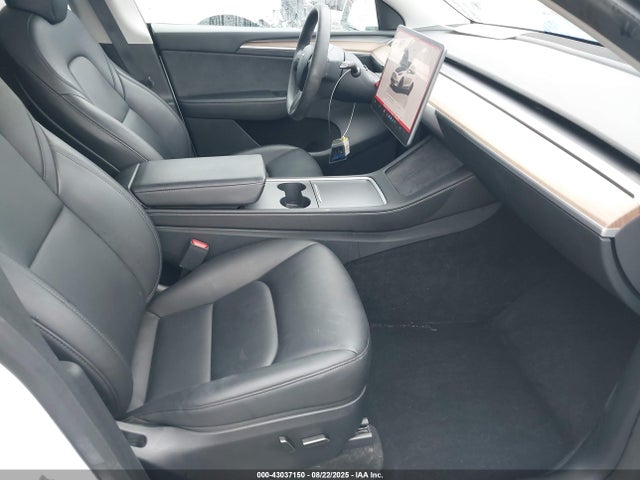 2023 TESLA MODEL Y 7SAYGDEF0PF835548 Photo 4