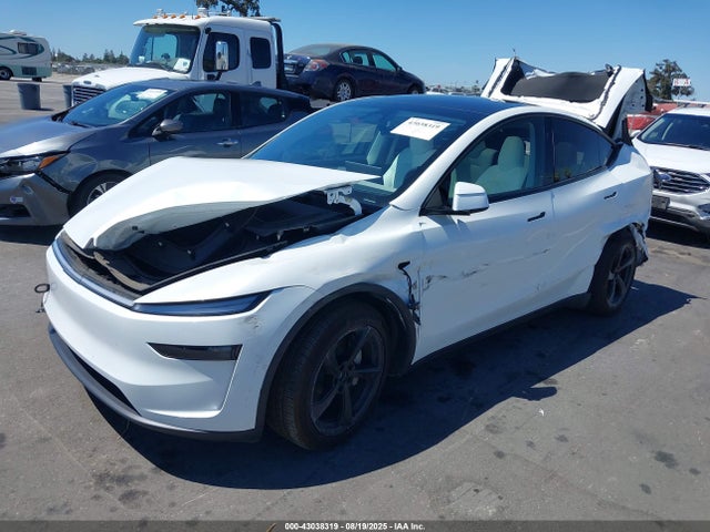 2026 TESLA MODEL Y 7SAYGDEE1TF328952 Photo 1