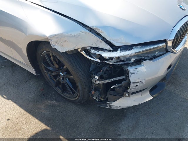 WBA5R1C59KAK12303 BMW 330I