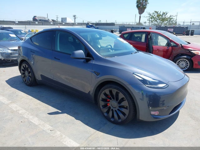 2023 TESLA MODEL Y 7SAYGDEF0PF801075 Photo 0