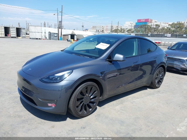 2023 TESLA MODEL Y 7SAYGDEF0PF801075 Photo 1