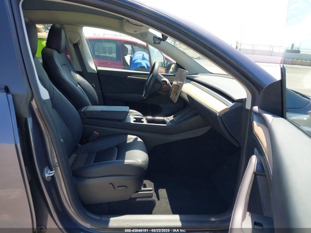 2023 TESLA MODEL Y 7SAYGDEF0PF801075 Photo 4