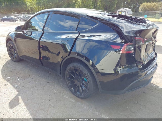 2023 TESLA MODEL Y 7SAYGDEE6PF836419 Photo 2
