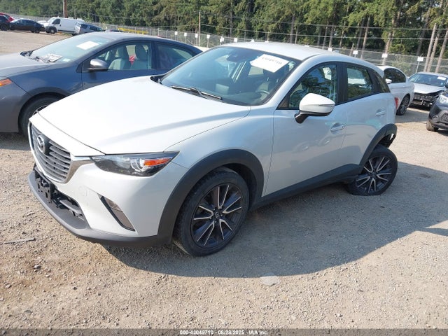 Mazda pe 2018 JM1DKFC73J0301080 Image 2