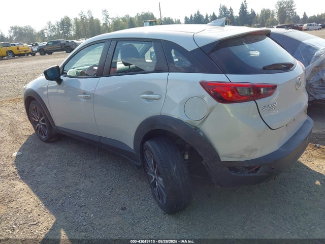 Mazda pe 2018 JM1DKFC73J0301080 Image 3
