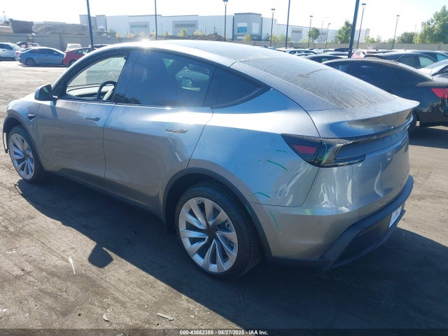 2026 TESLA MODEL Y 7SAYGDED9TA442640 Photo 2