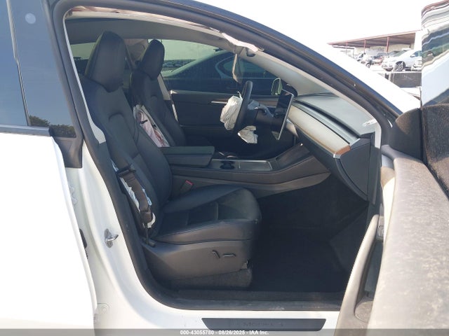 2023 TESLA MODEL Y 7SAYGDEE1PA129306 Photo 4