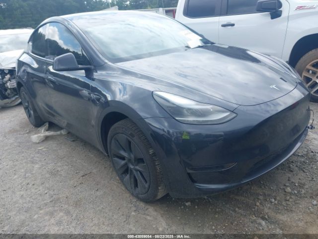 2024 TESLA MODEL Y 7SAYGDED4RA317585 Photo 0