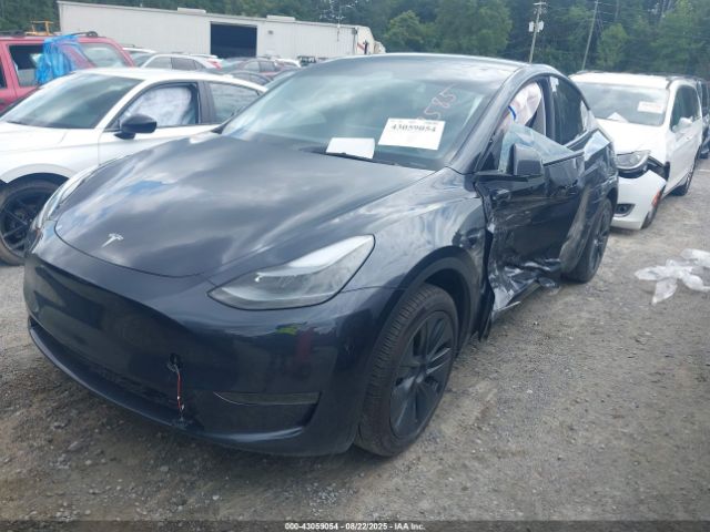 2024 TESLA MODEL Y 7SAYGDED4RA317585 Photo 1