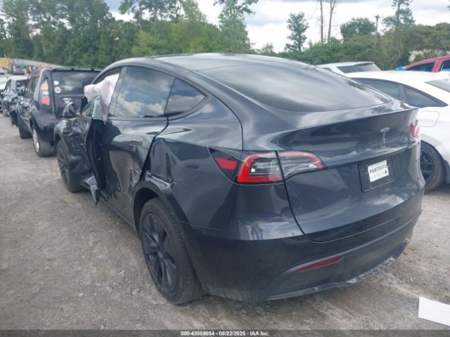 2024 TESLA MODEL Y 7SAYGDED4RA317585 Photo 2