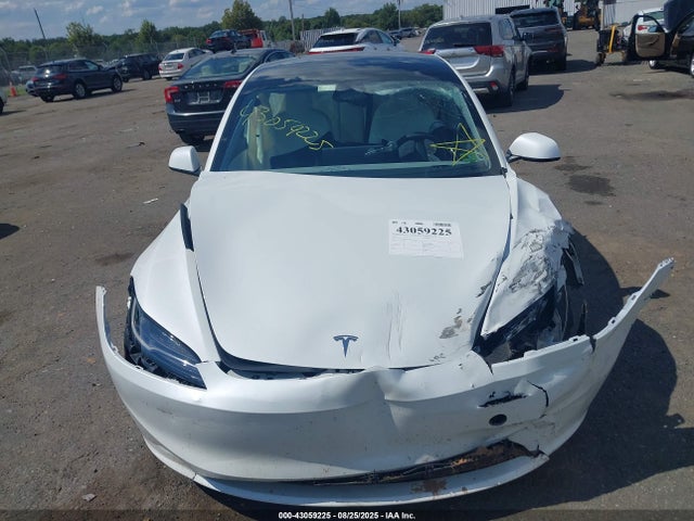 5YJ3E1EA9RF870107 Tesla 2024