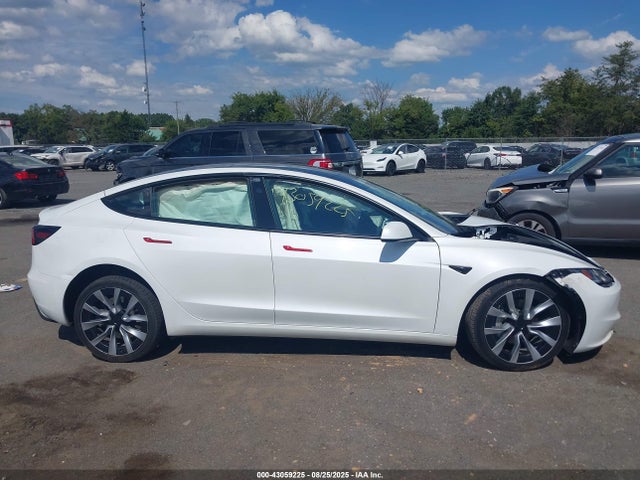 5YJ3E1EA9RF870107 Tesla 2024