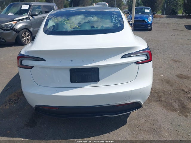 5YJ3E1EA9RF870107 Tesla 2024