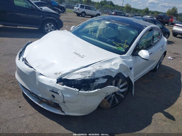 5YJ3E1EA9RF870107 Tesla 2024