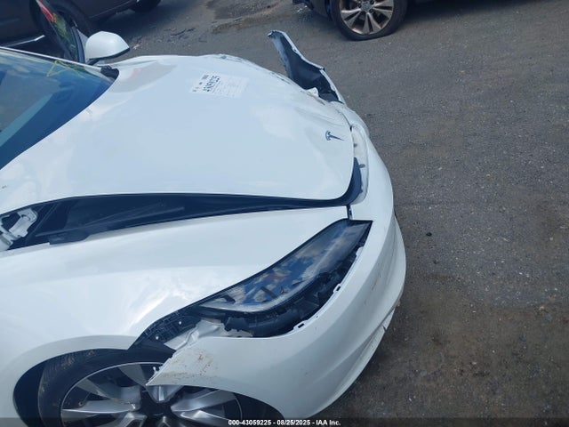 5YJ3E1EA9RF870107 Tesla 2024