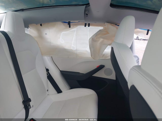 5YJ3E1EA9RF870107 Tesla 2024