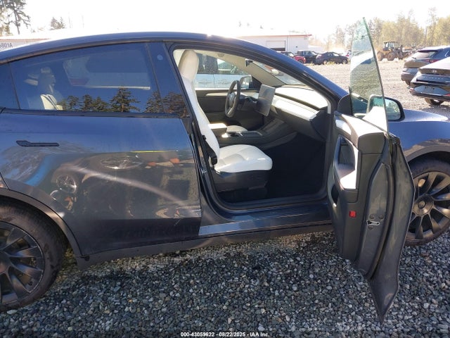 2023 TESLA MODEL Y 7SAYGDEE9PF614764 Photo 4