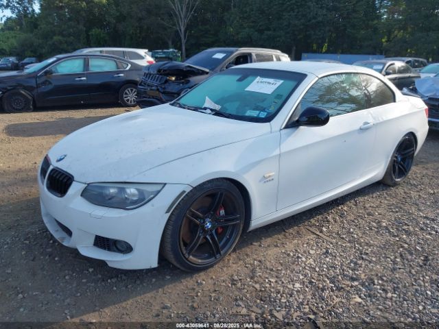 2011 BMW 335IS WBADX1C53BE569907 Photo 1