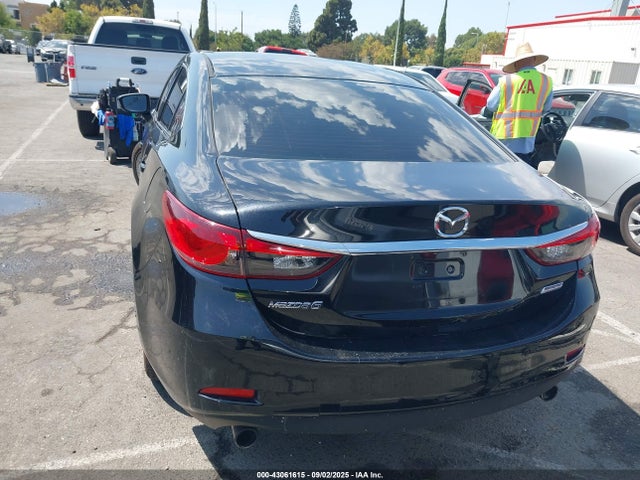 JM1GJ1U5XG1411286 Mazda py