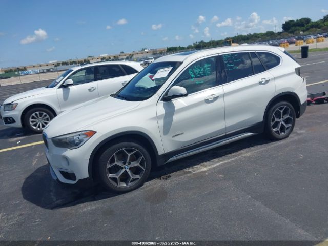 2018 BMW X1 WBXHU7C36J5H44587 Photo 1