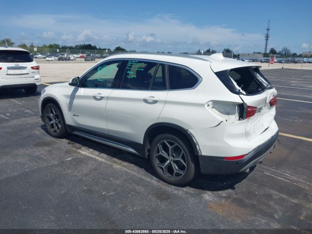2018 BMW X1 WBXHU7C36J5H44587 Photo 2