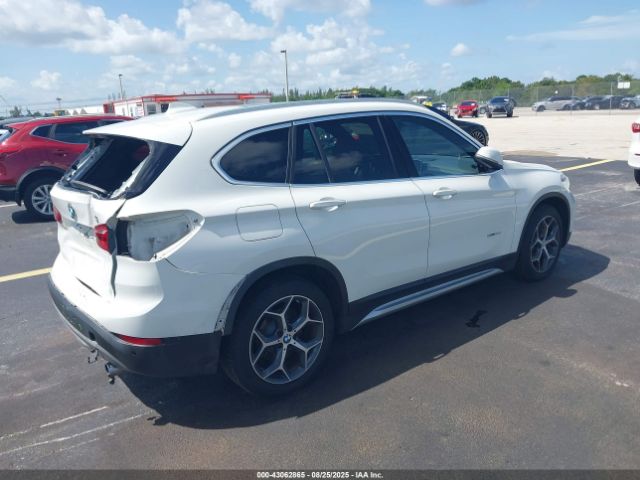 2018 BMW X1 WBXHU7C36J5H44587 Photo 3