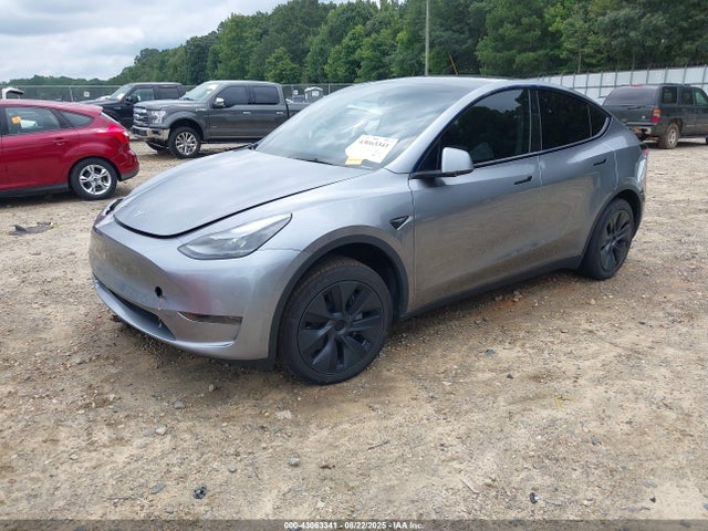 2025 TESLA MODEL Y 7SAYGDED0SA345552 Photo 1