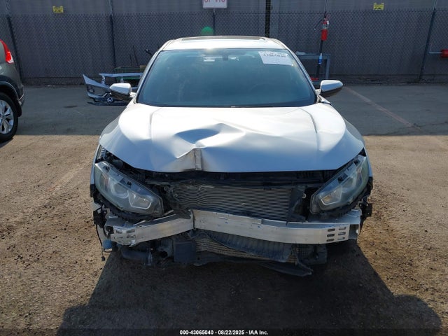 2HGFC1E54JH703479 Honda l15b7