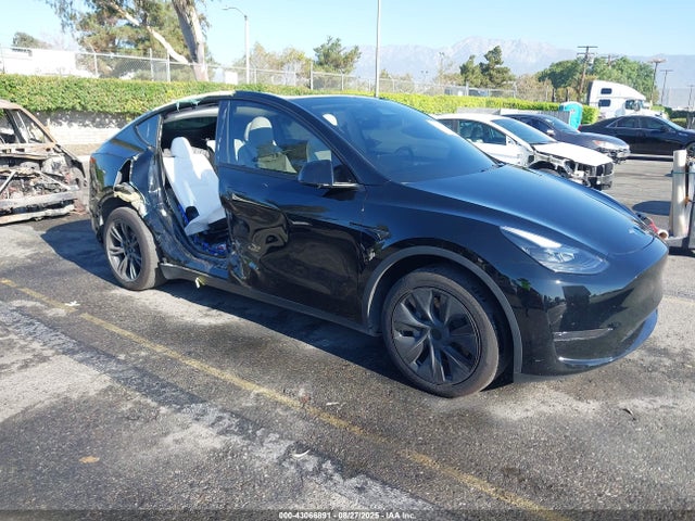 2025 TESLA MODEL Y 7SAYGDED3SF231189 Photo 0