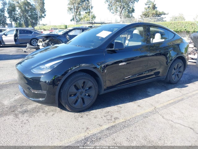 2025 TESLA MODEL Y 7SAYGDED3SF231189 Photo 1