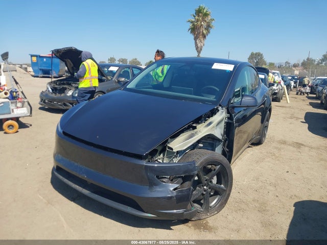 2026 TESLA MODEL Y 7SAYGDED9TF404831 Photo 1