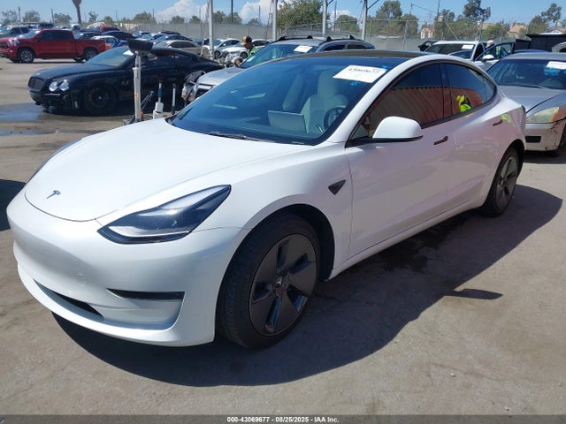 2023 TESLA MODEL 3 5YJ3E1EA7PF421912 Photo 1