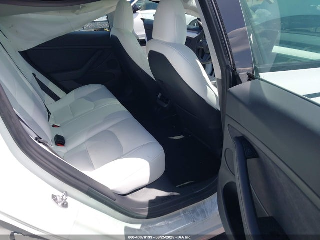 5YJ3E1EA6PF618134 Tesla 2023