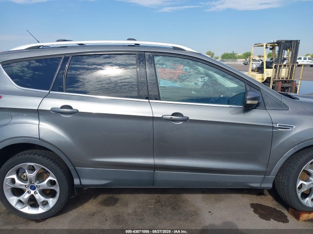 1FMCU0J94EUD31836 Ford Escape