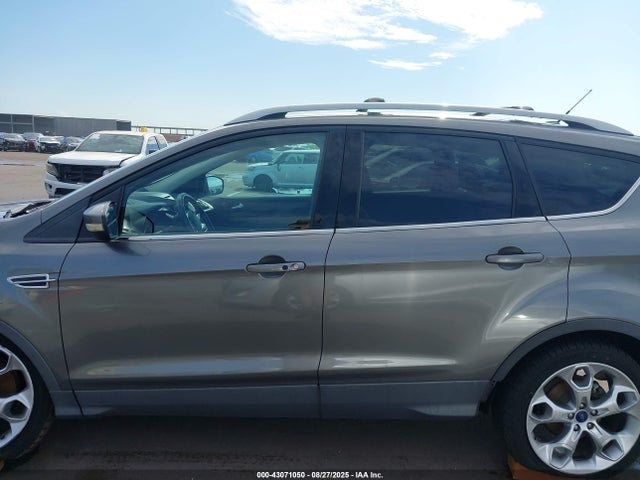 1FMCU0J94EUD31836 Ford Escape