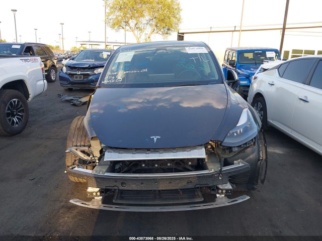 Tesla Model Y 2024 7SAYGDED3RF018527 Image 10
