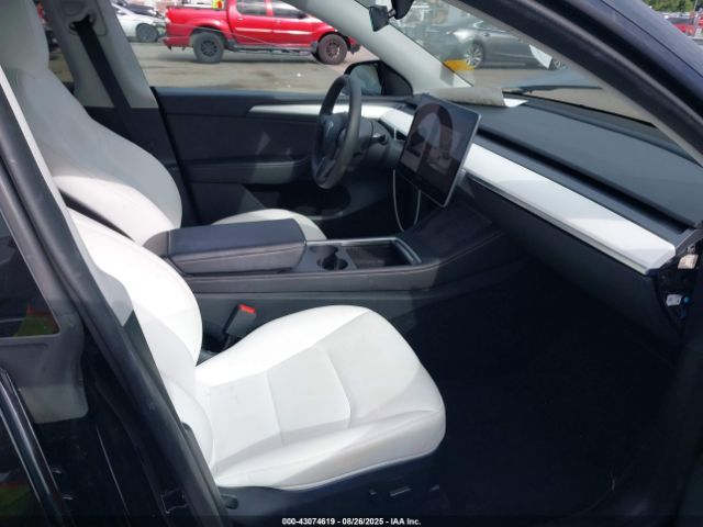 2023 TESLA MODEL Y 7SAYGAEE4PF961191 Photo 4